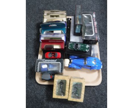 A tray containing assorted boxed and unboxed die cast cars, a Aulos recorder, two boxed Lord of The Rings die cast figures