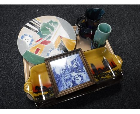 A tray of Rubena ware Art Deco jug, Art Deco pottery vase, Royal Doulton sandwich plate, framed blue and white tile, pottery 