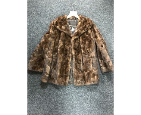 A vintage dark brown mink jacket