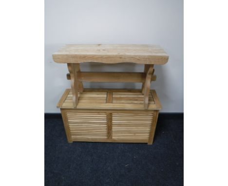 A plantation teak storage box, together with a pine bench 