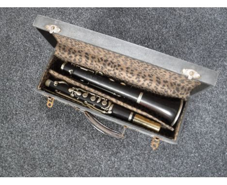 A cased two piece clarinet by Dore of Paris 