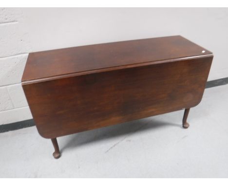 An antique mahogany gate leg table  