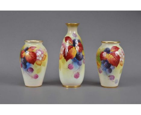 Three Royal Worcester hand-painted porcelain vases, with floral and fruit decorations by K. Blake (all signed), comprising a 