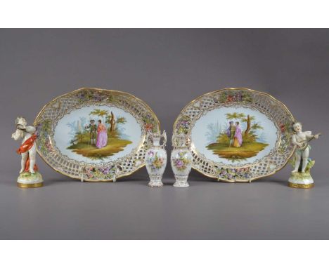 A collection of Dresden porcelain items, comprising two reticulated oval baskets (one cracked and crudely restored AF), both 