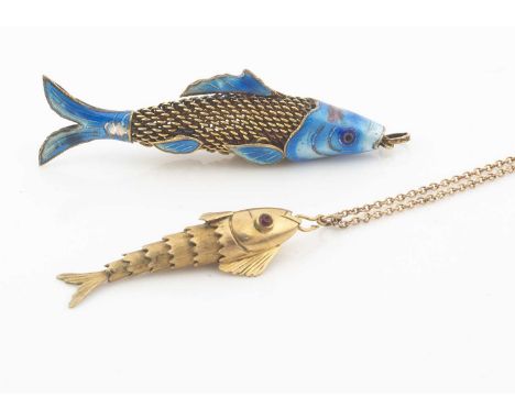 A silver gilt and enamel fish pendant, 6cm, together with a smaller gold plated articulated fish pendant on chain (2)