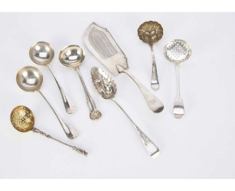 Seven 19th and 20th century silver spoons and a silver fish slice, including a pair of William Hutton &amp; sons soup spoons 