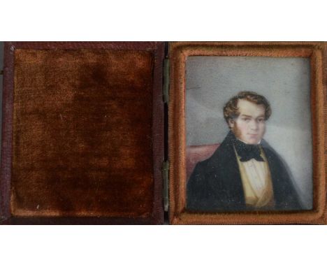 A 19th century Portrait miniature on ivory of a Georgian man, rectangular in shape, mounted within a leatherette case, work a