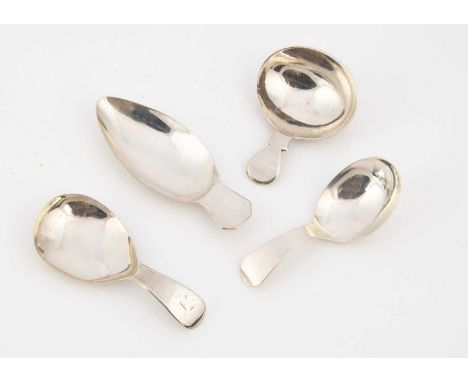 Four Georgian period silver tea caddy spoons, the longest is 8.7cm, possibly repaired, and three others (4)
