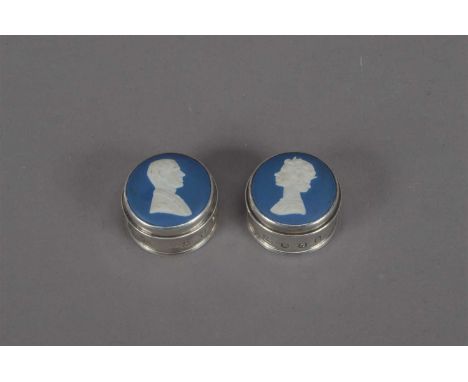 A pair of Elizabeth II silver circular trinket boxes with Wedgwood Jasperware ceramic covers, the covers with cameo's of Quee