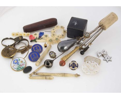 A collection of hat pins and stick pins, including a micro mosaic floral pin, a silver and simulated onyx hat pin, a collecti