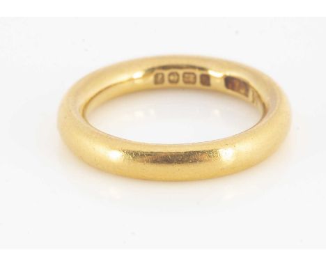 A 22ct gold round wedding band, ring size K, 3.3mm, 7.7g