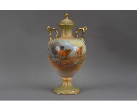 A 20th century Crown Devon ceramic twin-handled baluster urn and cover, the cover with a gilt finial (cracked), hand-painted 