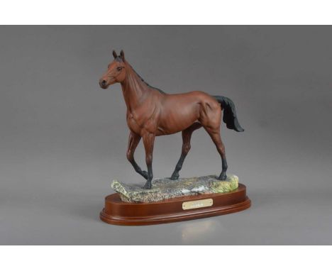 A limited edition 'Arkle' ceramic Royal Doulton horse, on a wooden base, no. 166/5000, marked to the underside, 35cm highAppe
