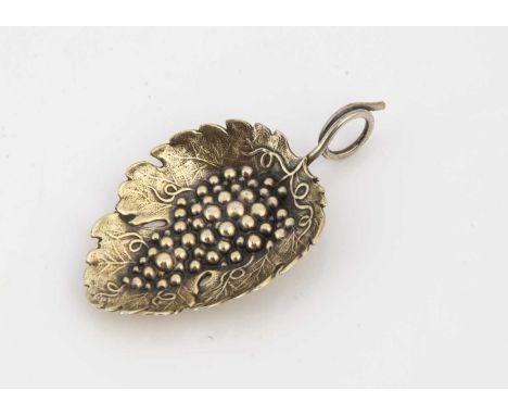 A Georgian period silver tea caddy spoon, with leaf shaped bowl and ring handle, possibly by JW