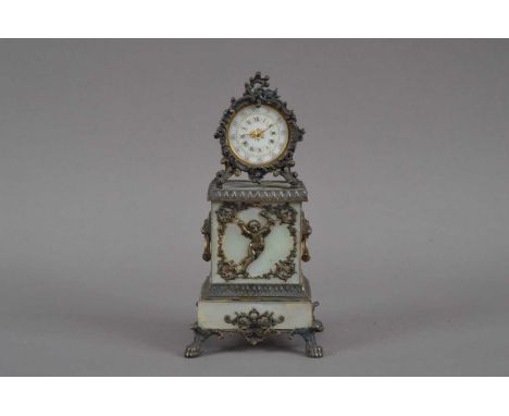 A 19th century Continental travelling mother-of-pearl and brass clock, the white dial with Roman and Arabic numerals, with he