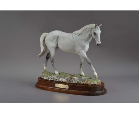 A limited edition 'Desert Orchid' ceramic Royal Doulton horse, on a wooden base, no. 547/7500, marked to the underside, 31cm 