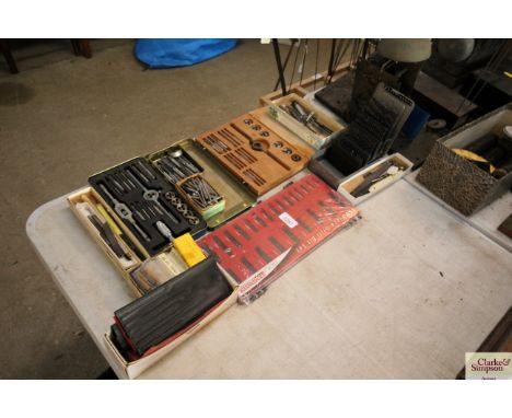 A collection of various taps, dies, and precision drill bits etc.
