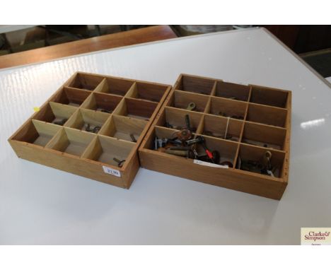 A quantity of various clock and watch keys 