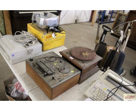 A vintage Tandberg Model 6 reel-to-reel player and an old gramophone base