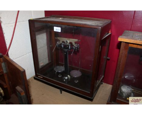 A cased set of chemist scales