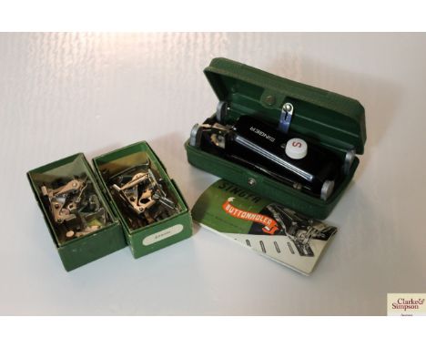 A Singer button holer etc. 