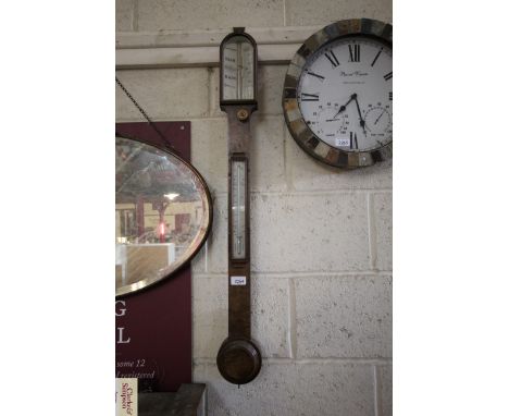 A 19th Century burr walnut stick barometer by Elliott &amp; Sons London