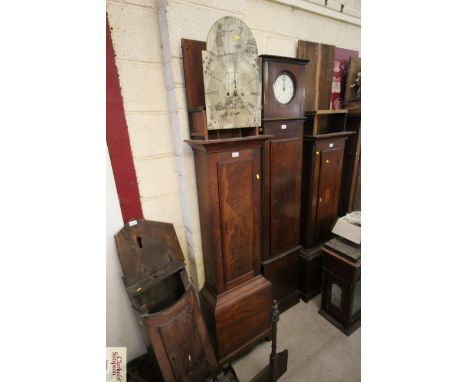 M. McGilchriste, a George III mahogany longcase clock with engraved foliate dial, in need of restoration, hood missing