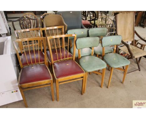 A set of four red upholstered seat stick back kitchen chairs and a set of 1950's green upholstered kitchen chairs