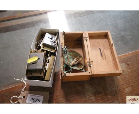 A box of locks and keys; and a set of antique brass travelling balance scales