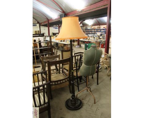 A standard lamp and shade 
