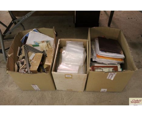 Three boxes containing ordnance survey maps; plastic bags; wall brackets etc
