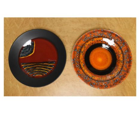 Poole Pottery Millennium Collection limited edition dish by Alan Clarke, 166/500, and a similar Saturn dish, each 26.5cm diam