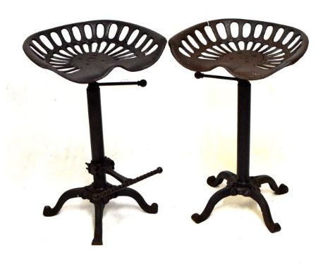 Industrial Design - Pair of cast metal tractor seat bar stools  