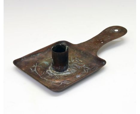 Newlyn copper chamber candlestick, having embossed decoration of two stylised fish and stamped Newlyn, 21cm long  