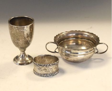 Edward VII silver two handled dish, London 1904, Edward VII silver napkin ring, Birmingham 1902 and a George VI silver trophy