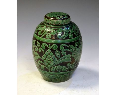 Sheldon Pottery ovoid jar and cover with foliate relief decoration, 19.5cm high  