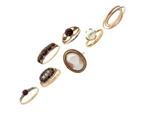 Seven various 9ct gold, yellow metal and other rings to include; a three-colour 'Trinity' ring, cameo ring, pearl-set ring et