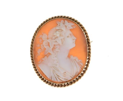 9ct gold shell cameo brooch carved with a female profile portrait of Flora, in 9ct gold rope-twist surround, 10.2g gross appr