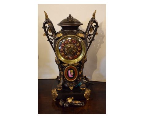 Late 19th Century French bronzed and gilt spelter, enamel and porcelain mantel clock, Vincenti &amp; Cie, Paris, the red cell