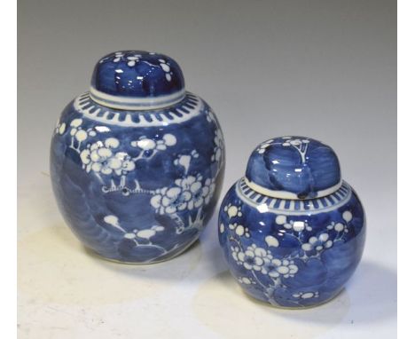 Two Chinese porcelain ginger jars, each with prunus decoration, double ring marks to base, larger 16cm high (2)  