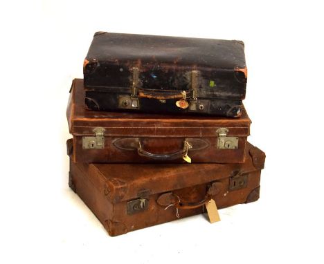 Three vintage leather suitcases  
