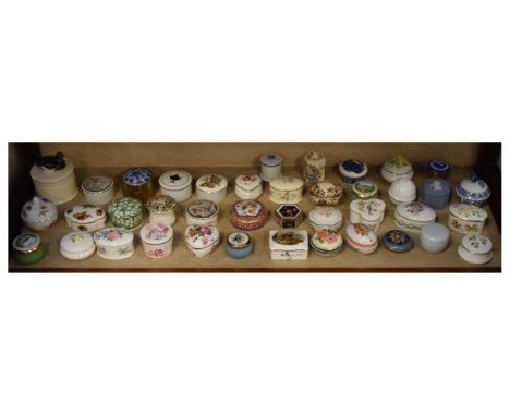 Large collection of ceramic pill boxes, together with a few enamel examples (40)  
