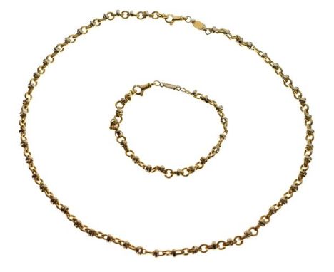 Yellow metal fancy-link necklace stamped ORI 829 AR 750, of alternate circular and elongated belcher links with moveable ring