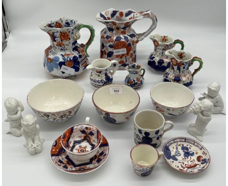 A Selection of porcelain wares to includes Mason's Ironstone water jugs, Sutherland lustre style bowls and cups and various c