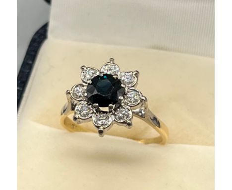 18ct gold ladies Diamond and Sapphire ring. [Diamonds 0.24cts] [Sapphire 6mm] [Ring size Q] [3,83grams] 