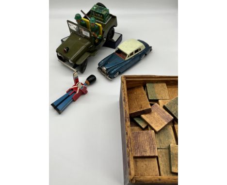 A Lot of vintage tin plate and wooden toys to include tin plate military motor and two soldiers, Rolls- Royce Silver Cloud ti