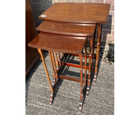 A Nest of three antique/ vintage tables. designed on turned supports. [67x51x37cm] 