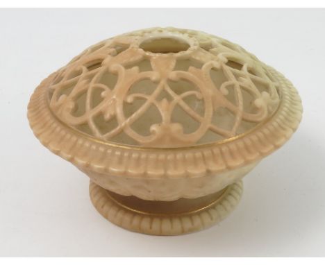 A Royal Worcester blush ivory centre piece, with pierced body, shape number G392, dated circa 1904, diameter 4ins

