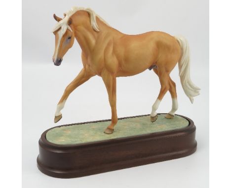 A Royal Worcester limited edition model, Palomino, modelled by Doris Lindner, with box, plinth and certificate
