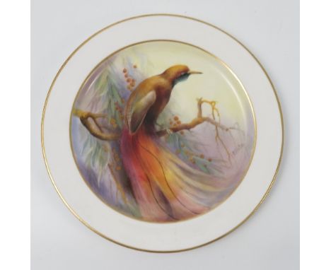 A Royal Worcester plate, decorated with an Australian Paradise Rubra bird by R Austin, dated circa 1926, diameter 8.5ins